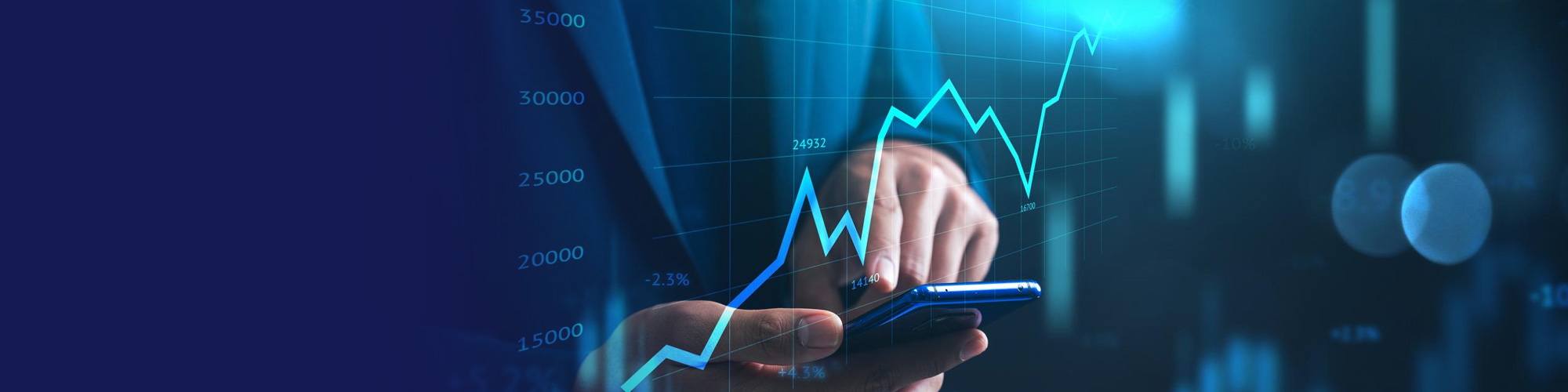 Hand holding a smartphone with a rising financial chart overlay