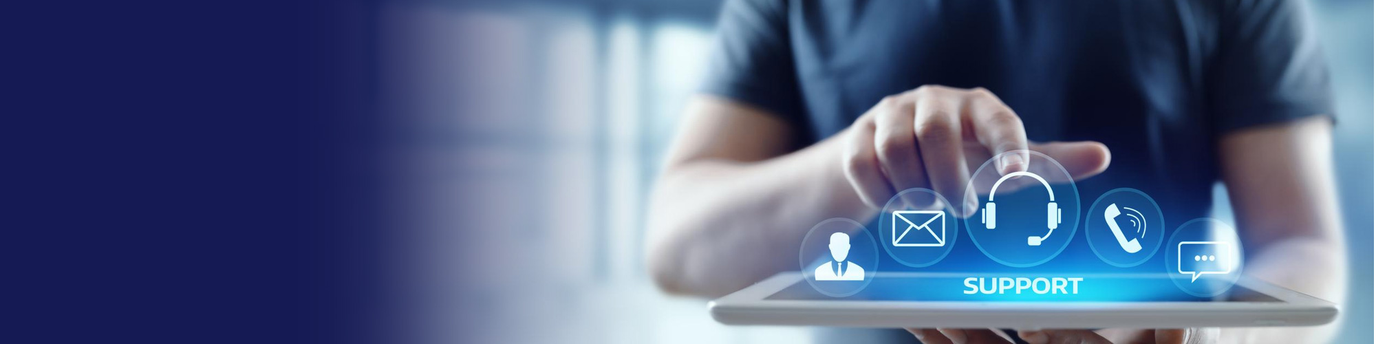 Technician tapping a support icon on a tablet with phone, email and chat options
