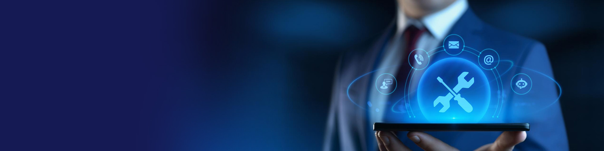Consultant holding a tablet with a glowing tools icon